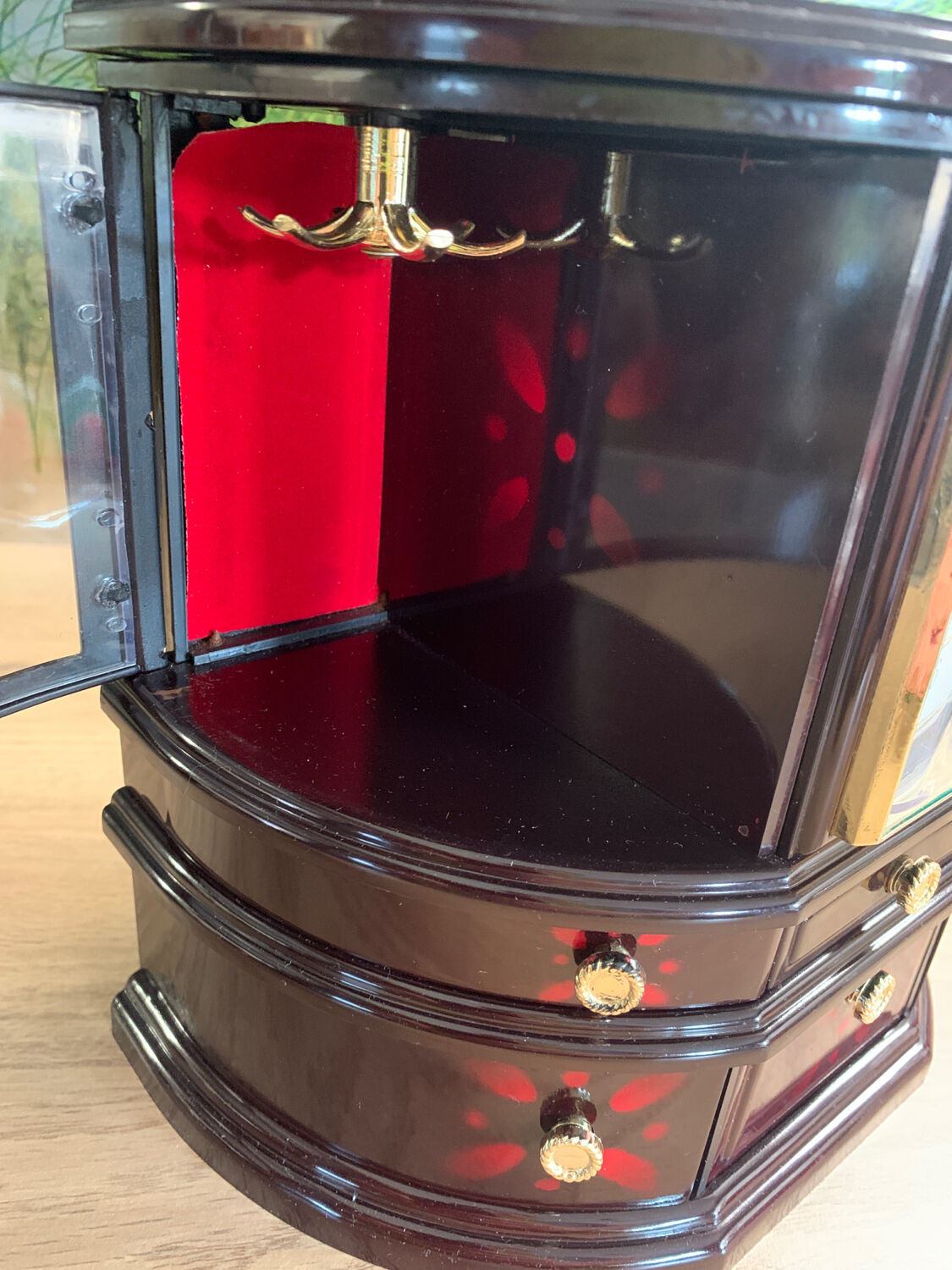 Jewelry cabinet with clock