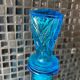 Blue chiseled glass bottle