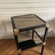 Pair of vintage metal and smoked glass side tables
