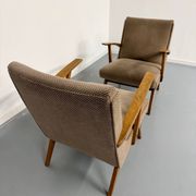 Set of 2 vintage wooden and fabric armchairs designed in the 1960s.