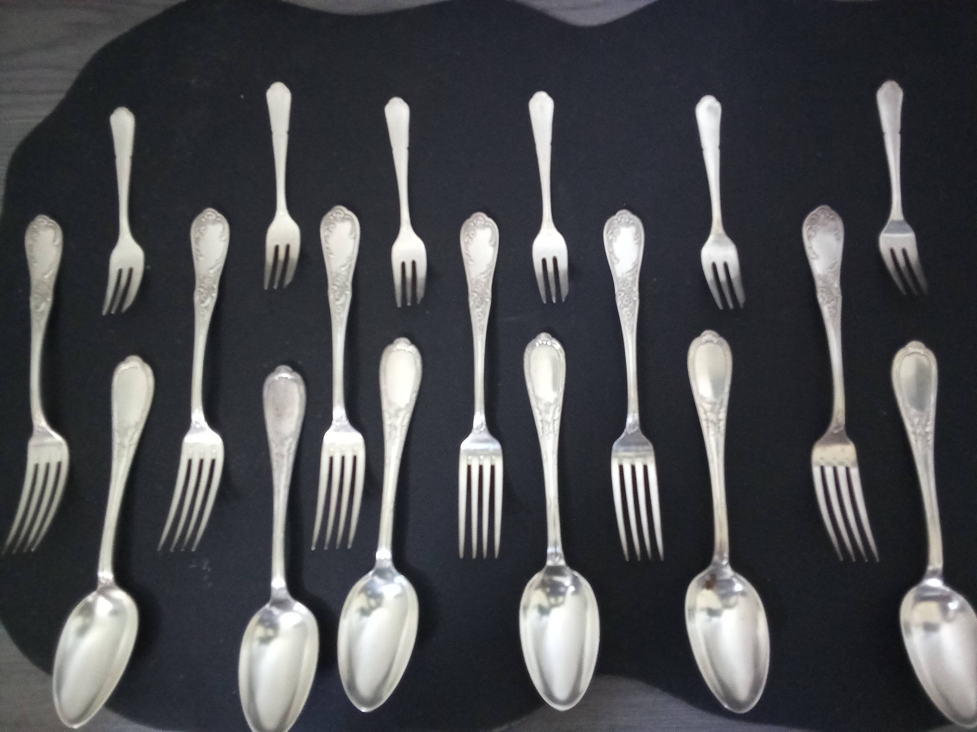 200 pieces of Russian silverware (spoons, forks and knives).