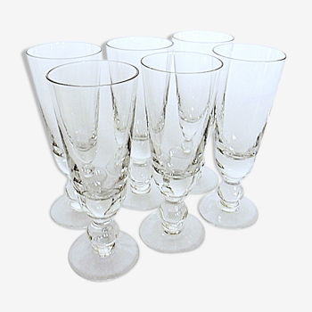 Suite of six former crystal champagne flutes