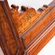 Bed made of solid walnut with marquetry details. France, 1930s.