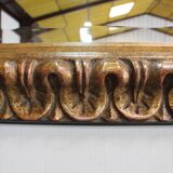 Gold-tinted wooden and stucco rectangular mirror - 1920