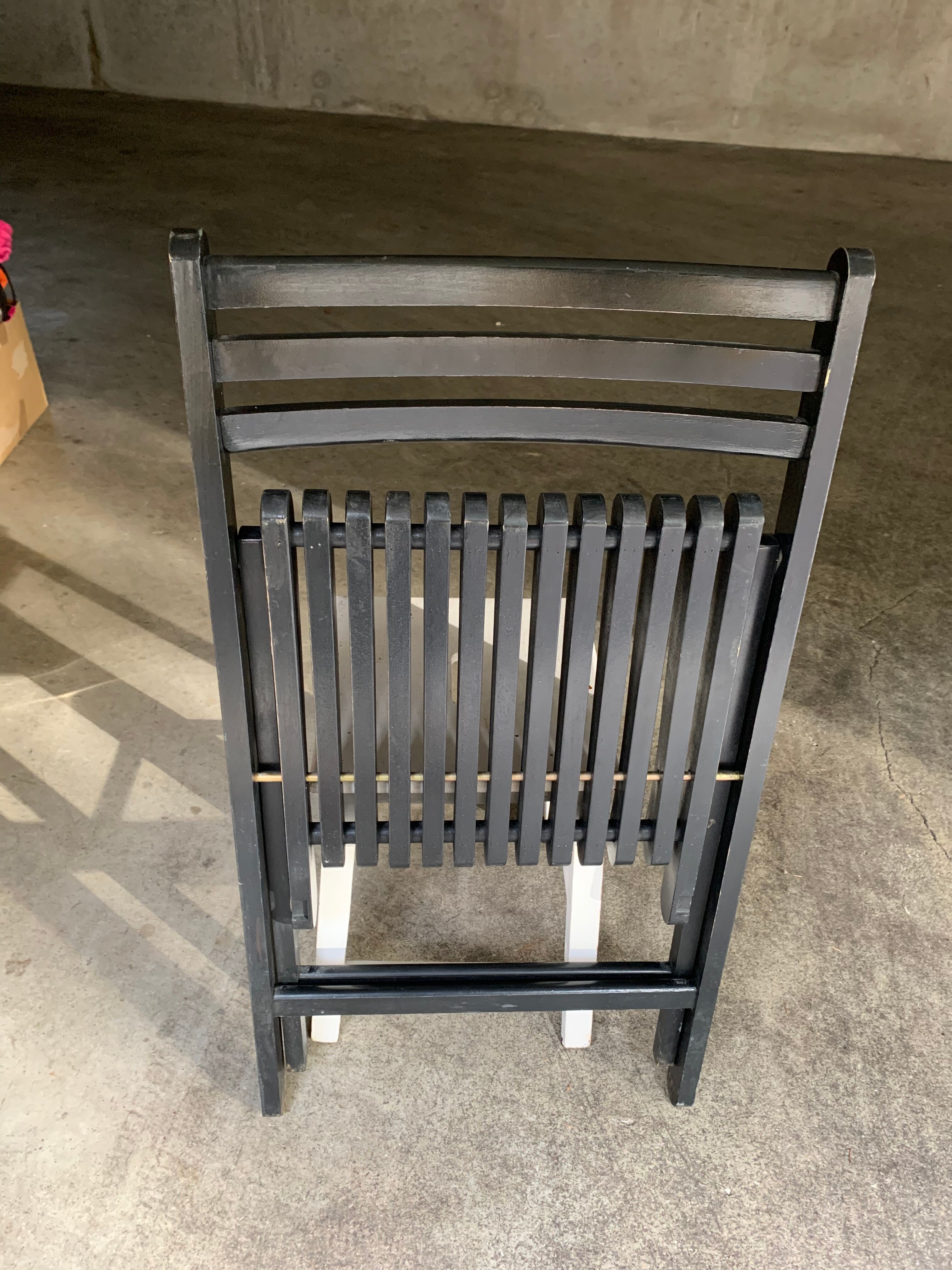 Pair of black folding chairs