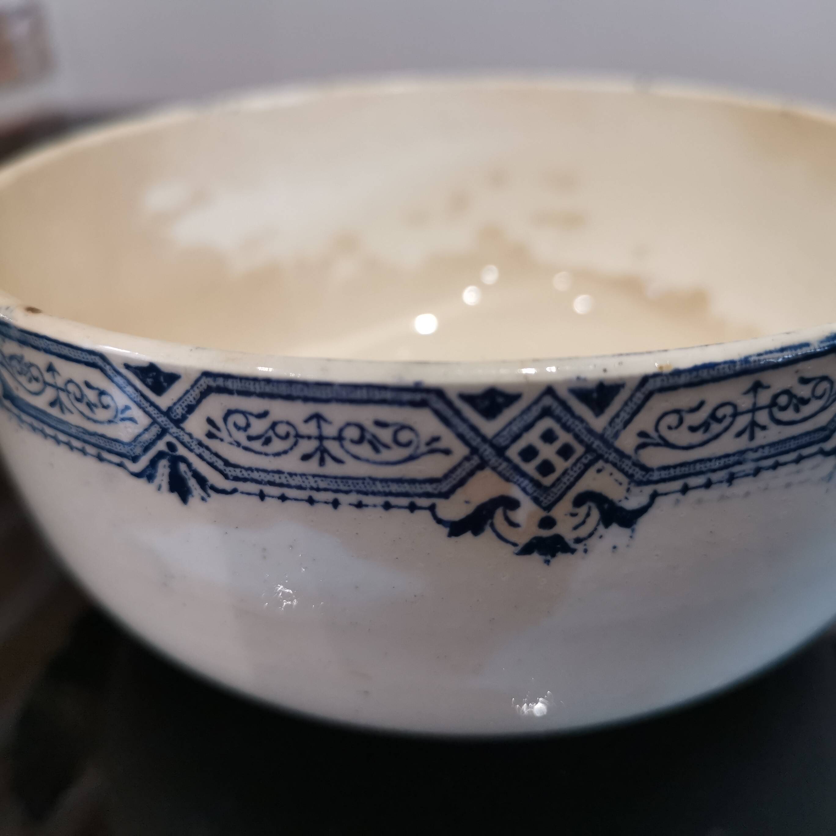 Butterfly ear bowl in iron clay with blue patterns