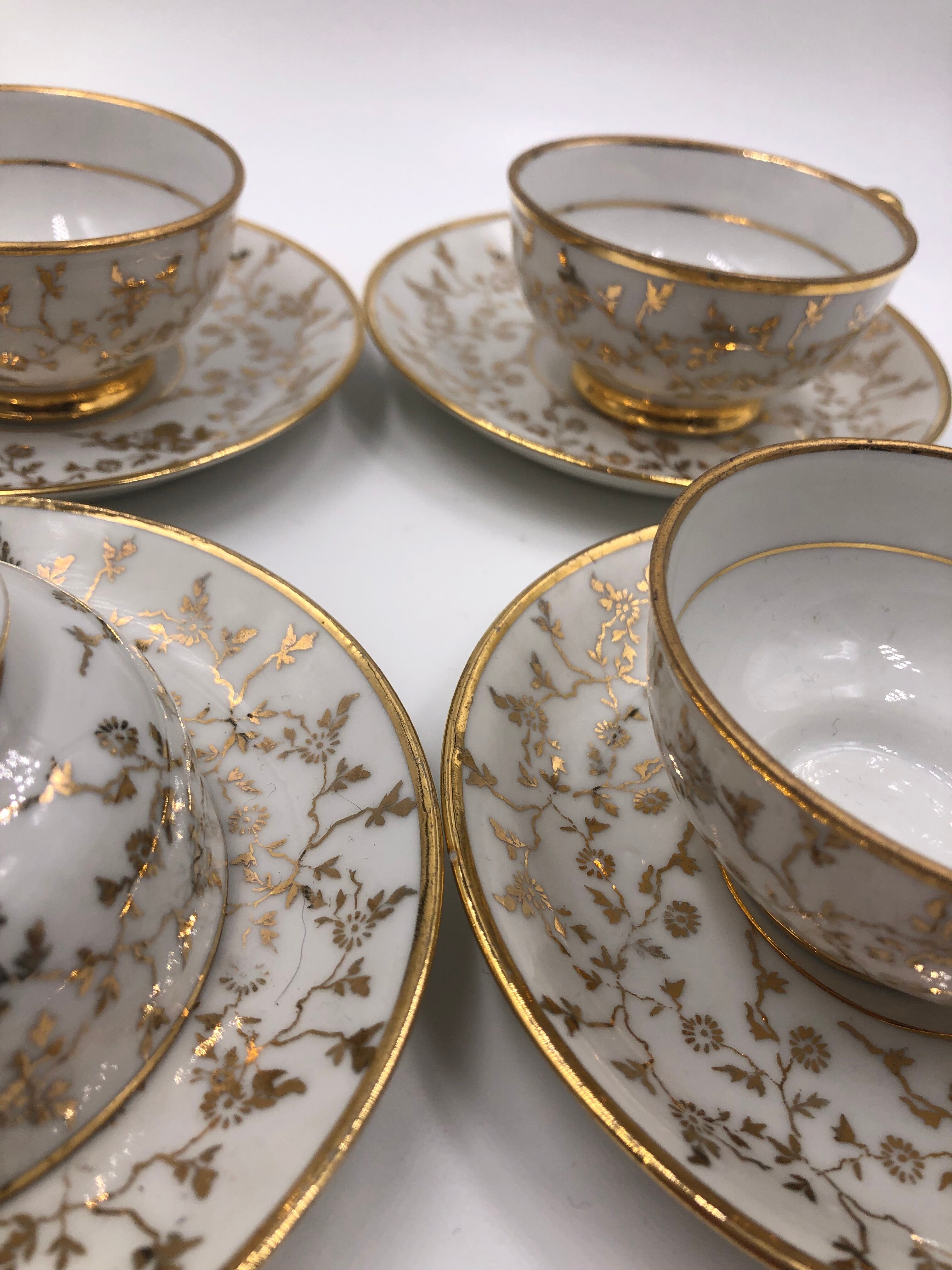 Serving together 4 cups and under cups coffee/tea flowers porcelain golden Vintage