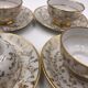 Serving together 4 cups and under cups coffee/tea flowers porcelain golden Vintage