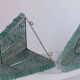 Pair of pyramid-shaped wall sconces in glass in vintage French style.