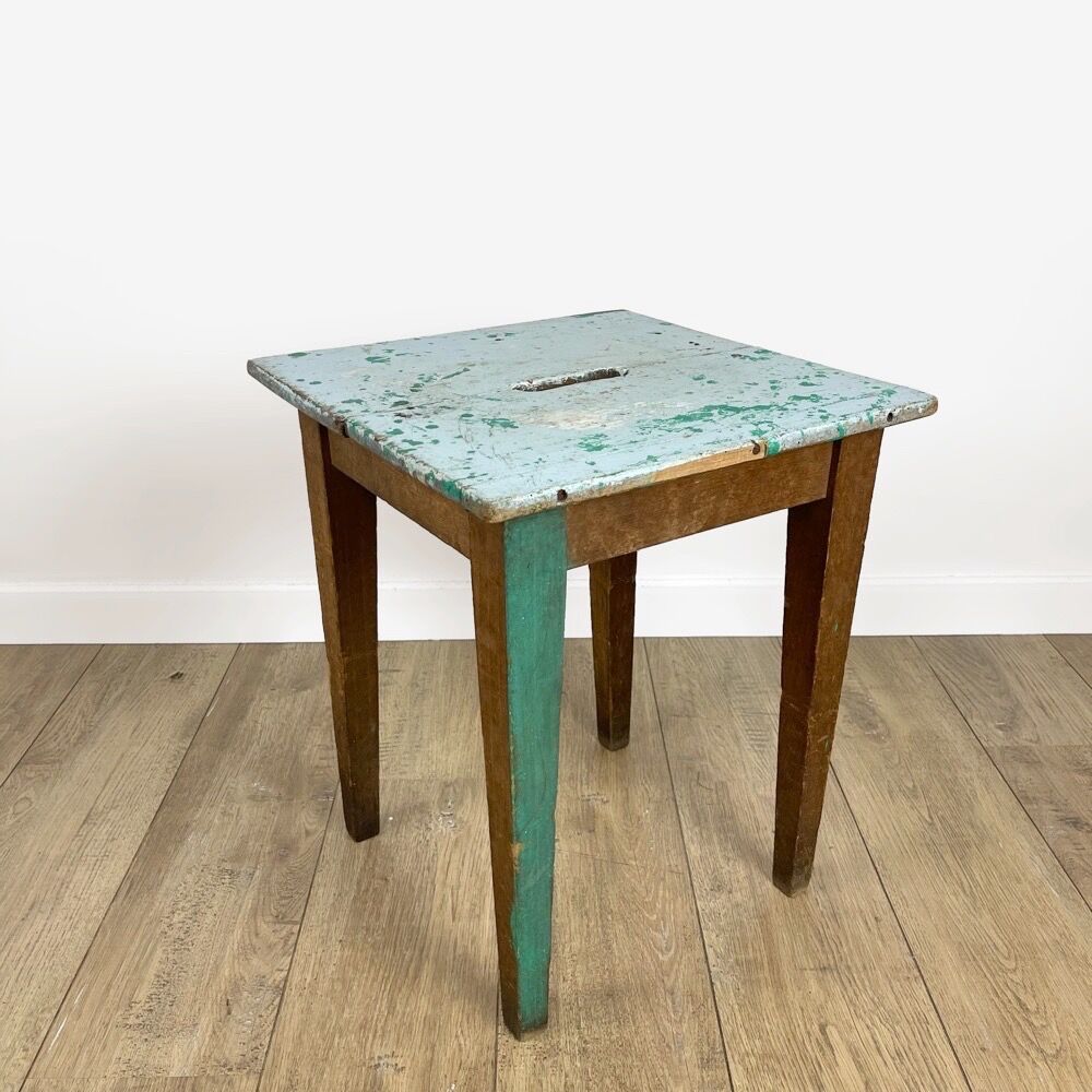 Old wooden slot stool