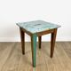 Old wooden slot stool