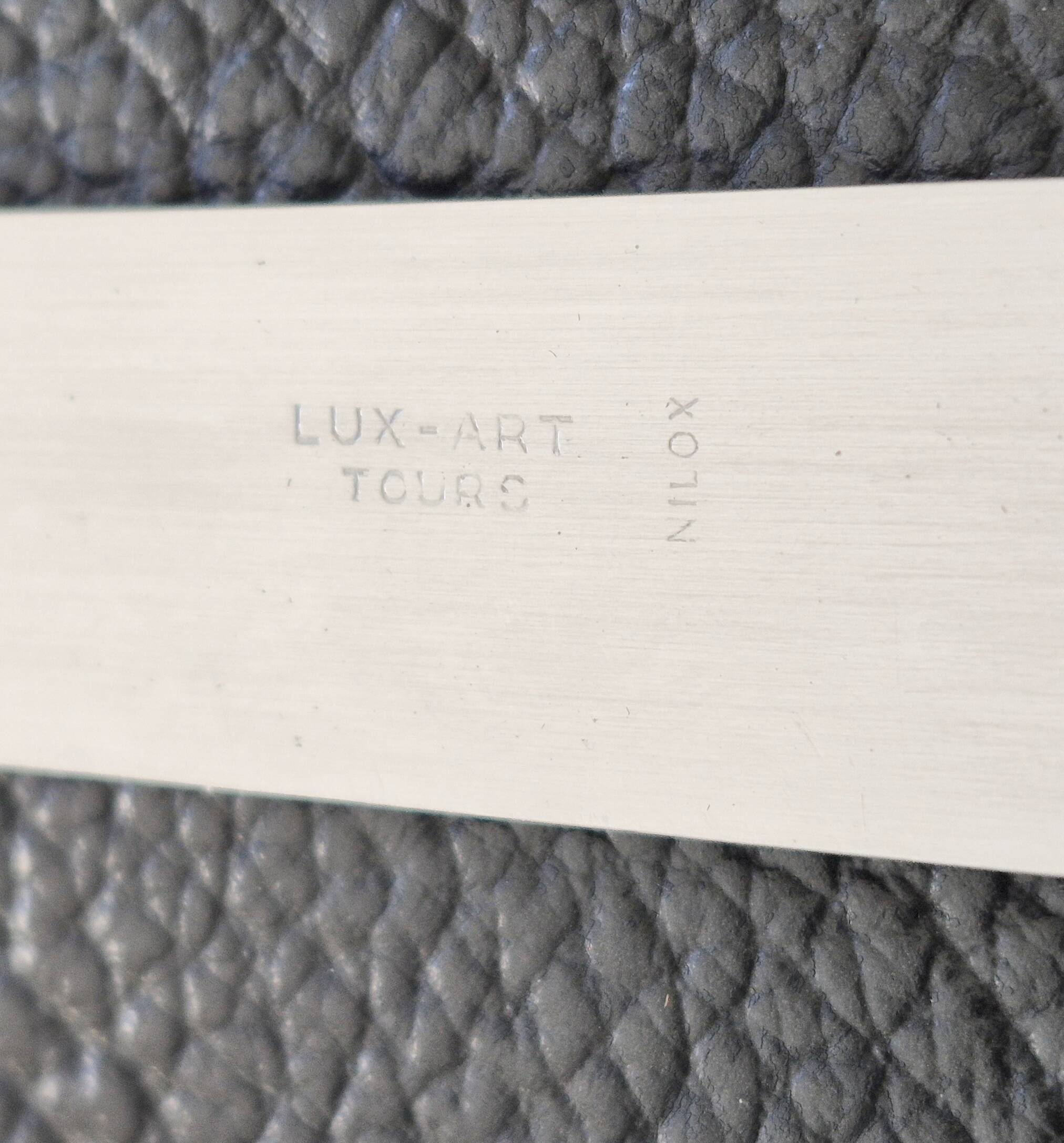 Silver and ebony table knives, stainless steel blade, Louis XVI style