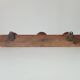 Antique folk art wall coat rack from the 50s