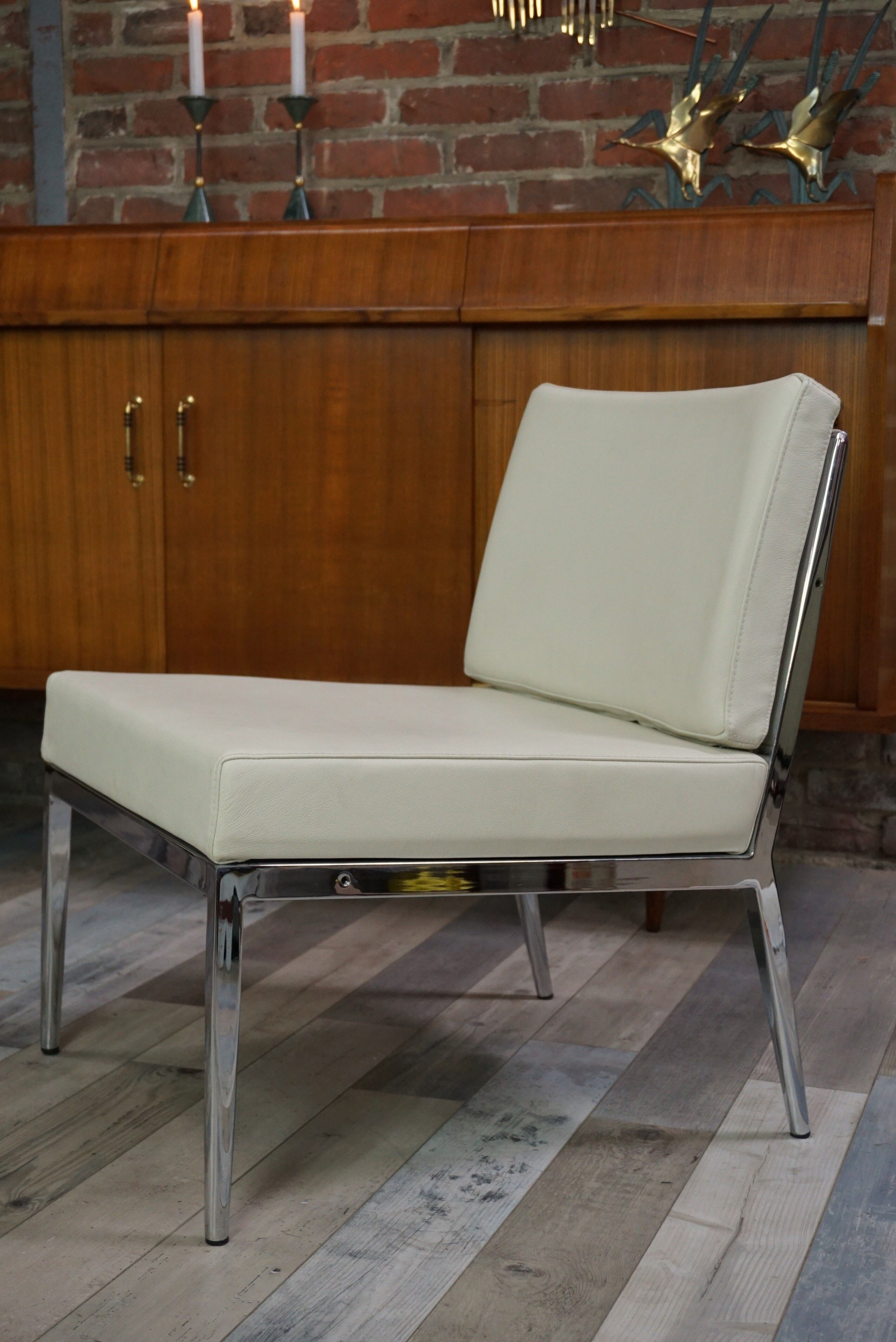 Pair of chrome and leather armchairs