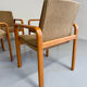 4 armchairs with armrests in beech and fabric, 1970s vintage design.