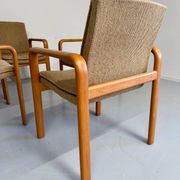 4 armchairs with armrests in beech and fabric, 1970s vintage design.