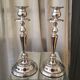 Pair of candle holders in sober and elegant silver metal