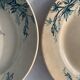 8 plates and an old compoter Terre de Fer HB and Co.