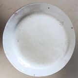 Rare assiette Les islettes en faïence à décor d'un paon. XIXème siècle.