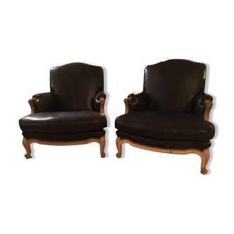 Pair of wing chairs in leather