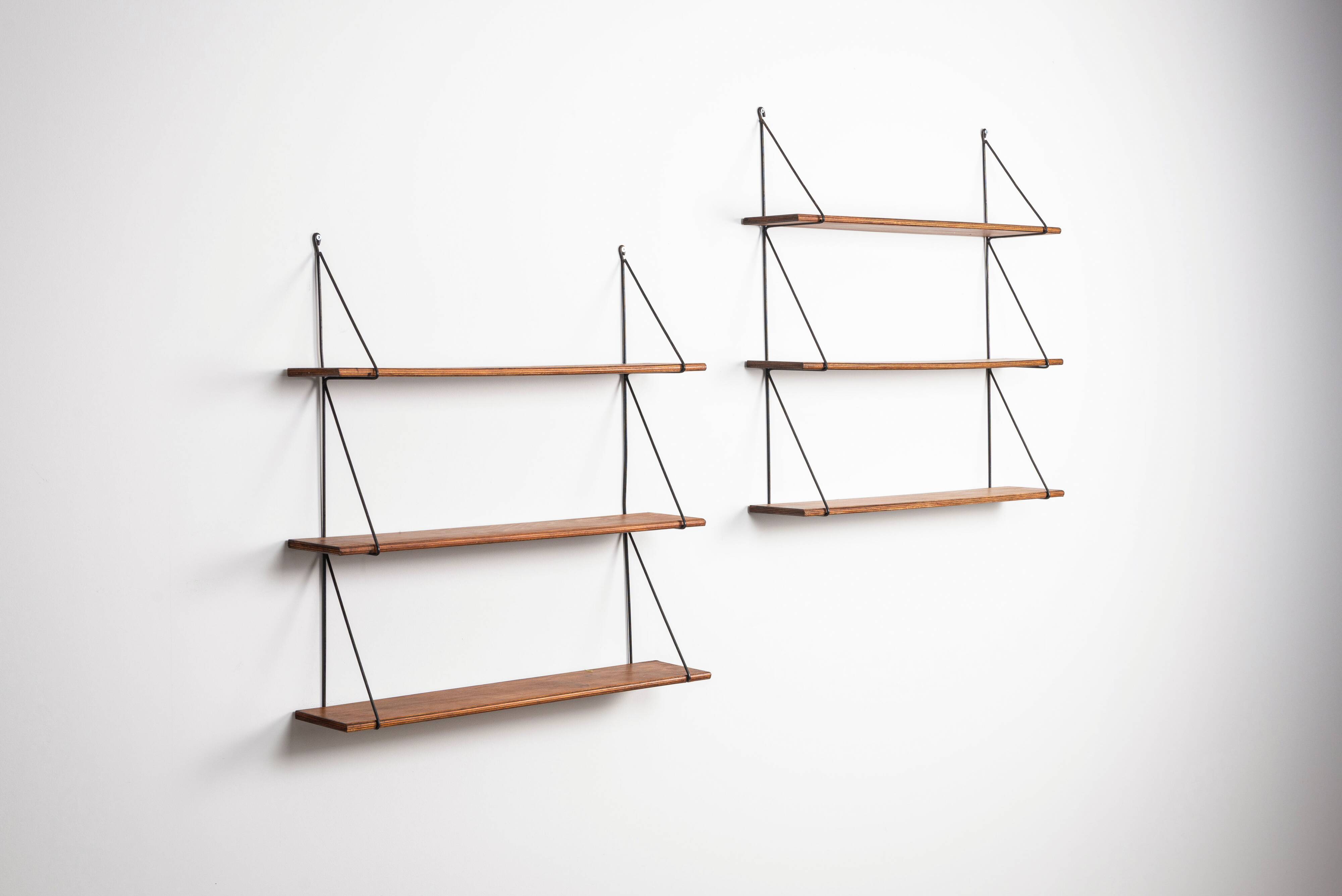Set of minimalistic wooden shelving units