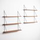 Set of minimalistic wooden shelving units