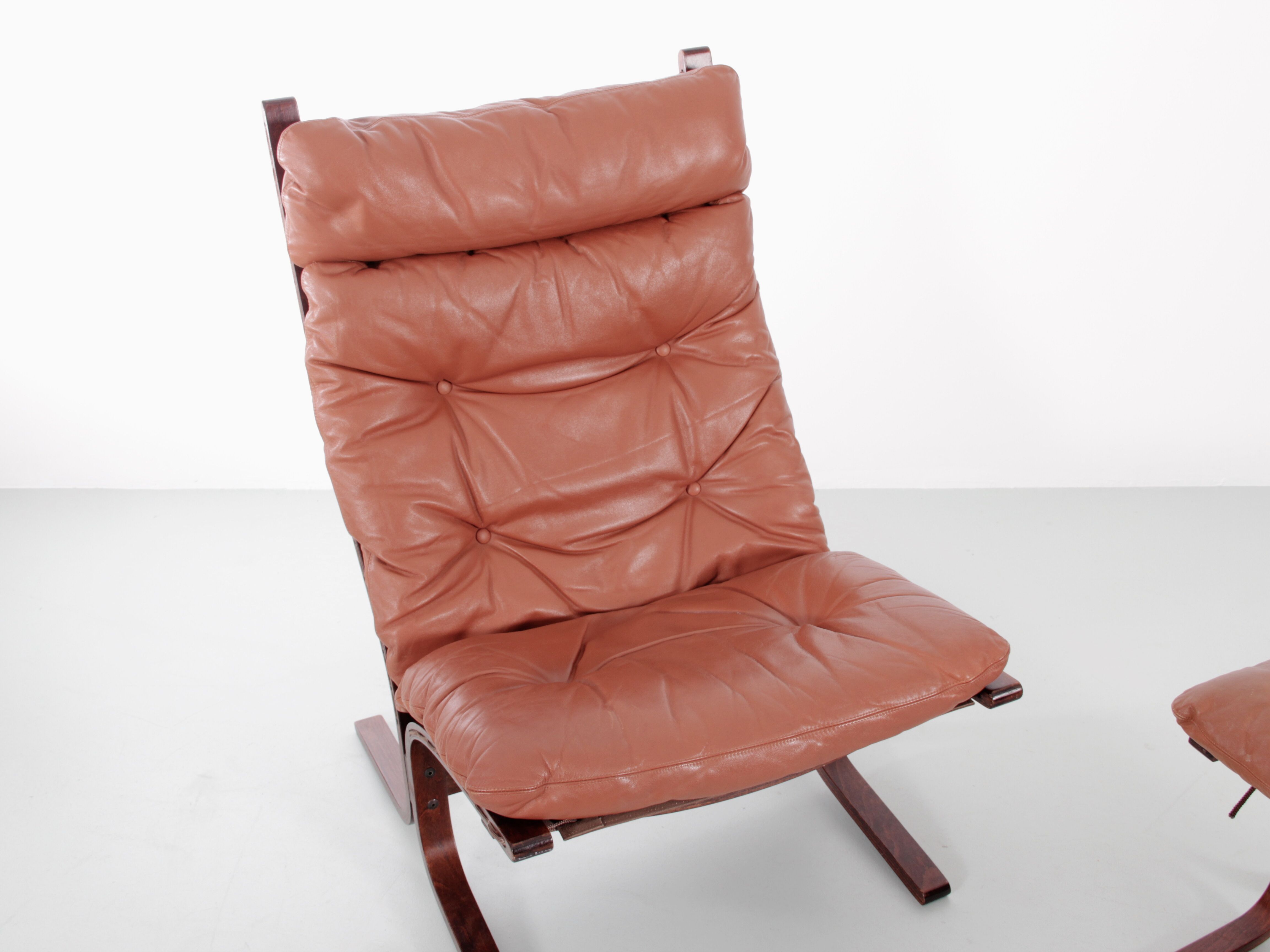 Scandinavian chair model Siesta, high back and foot rests
