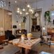 Timeless modern Scandinavian / mid-century chandelier in chrome and smoked glass.