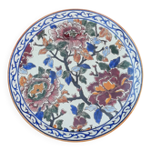 Gien earthenware plate with peony decoration.