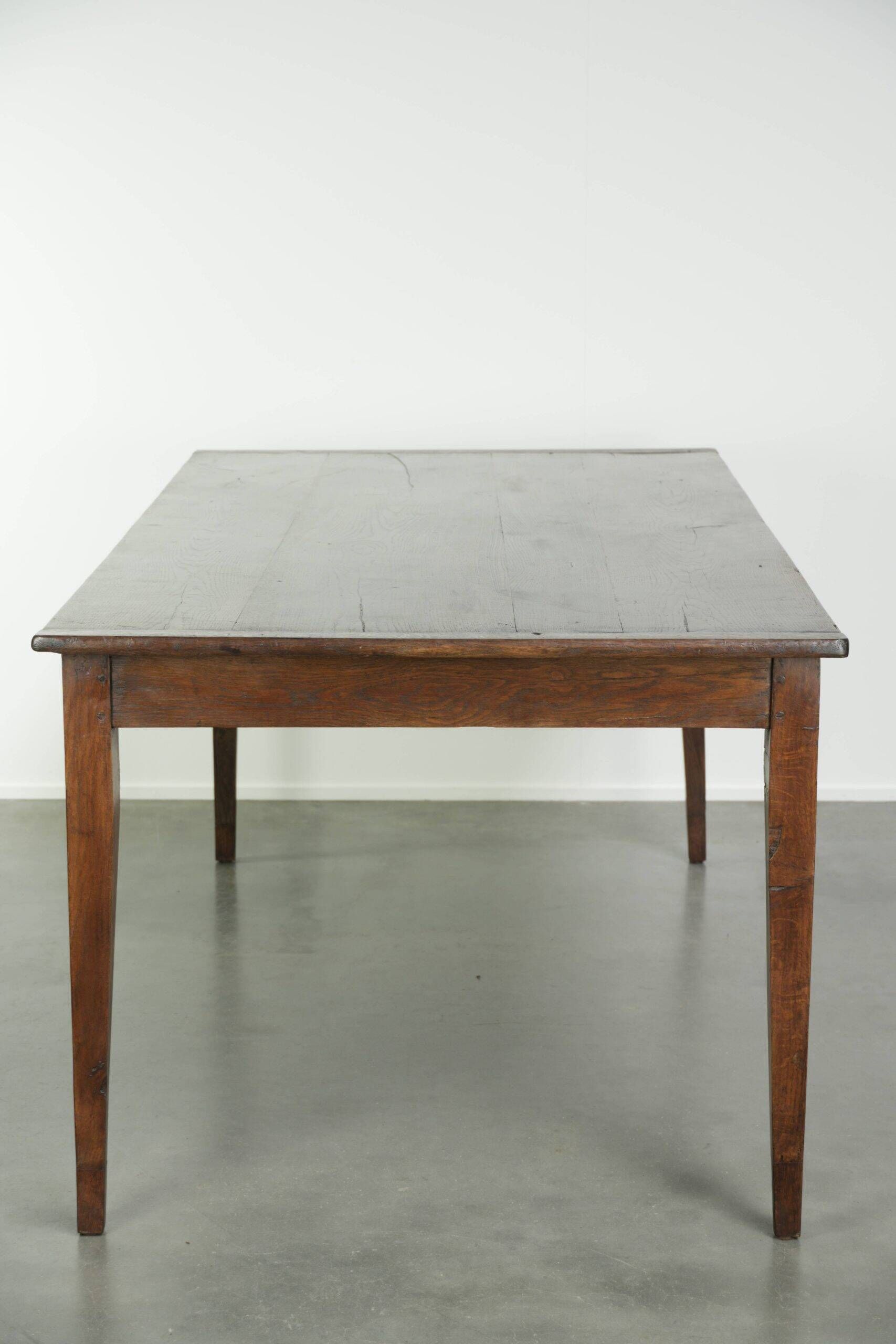 Antique French oak dining table from the early 19th century