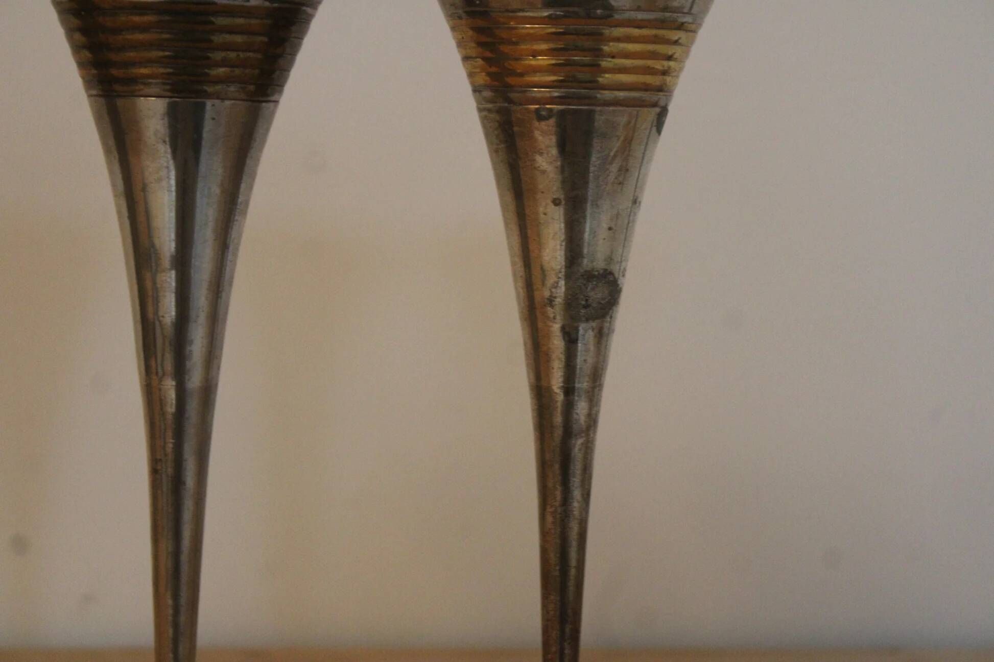 Set of 3 vintage silver-plated and gold footed cups.
