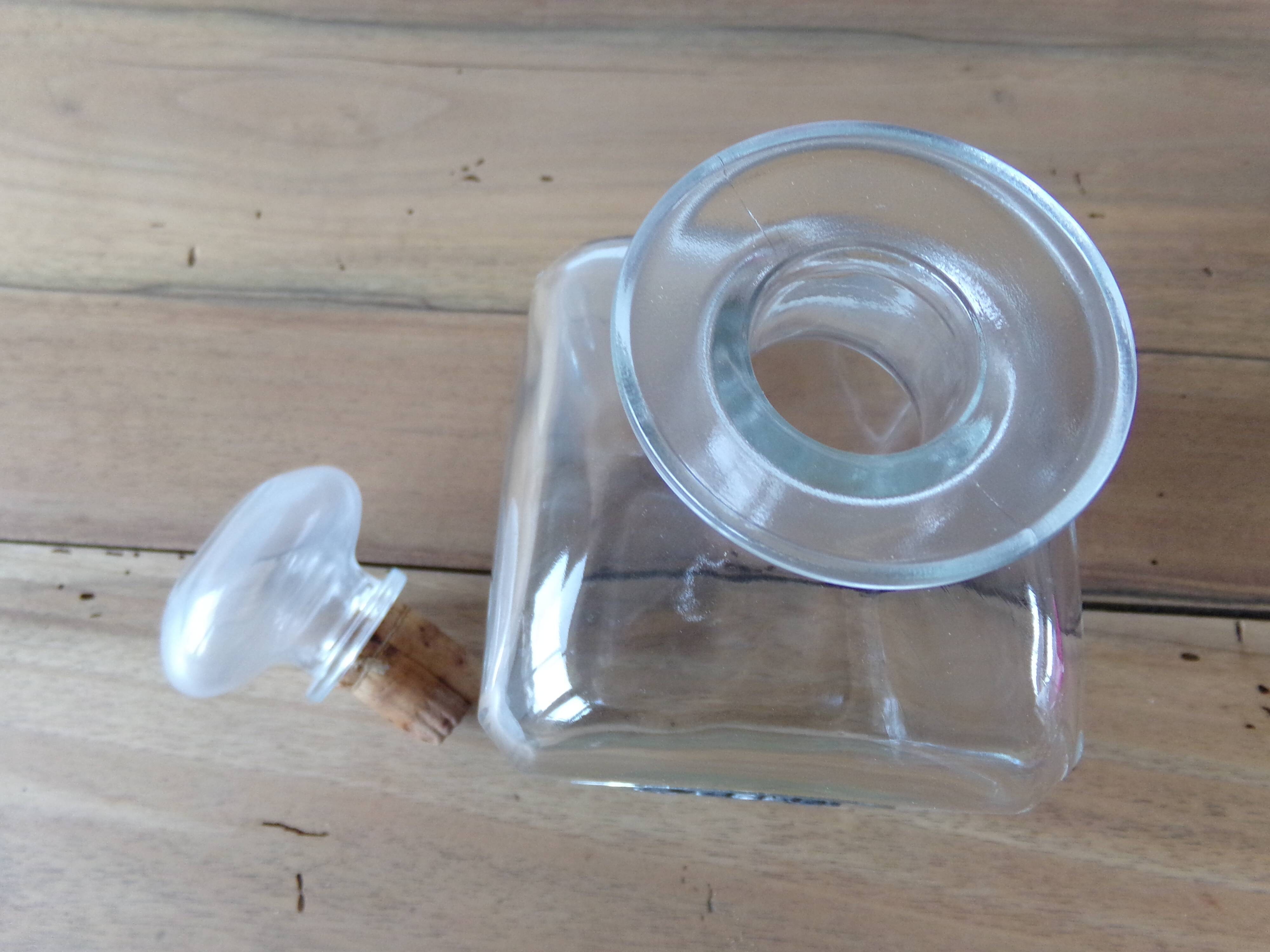 Glass and tin whiskey decanter