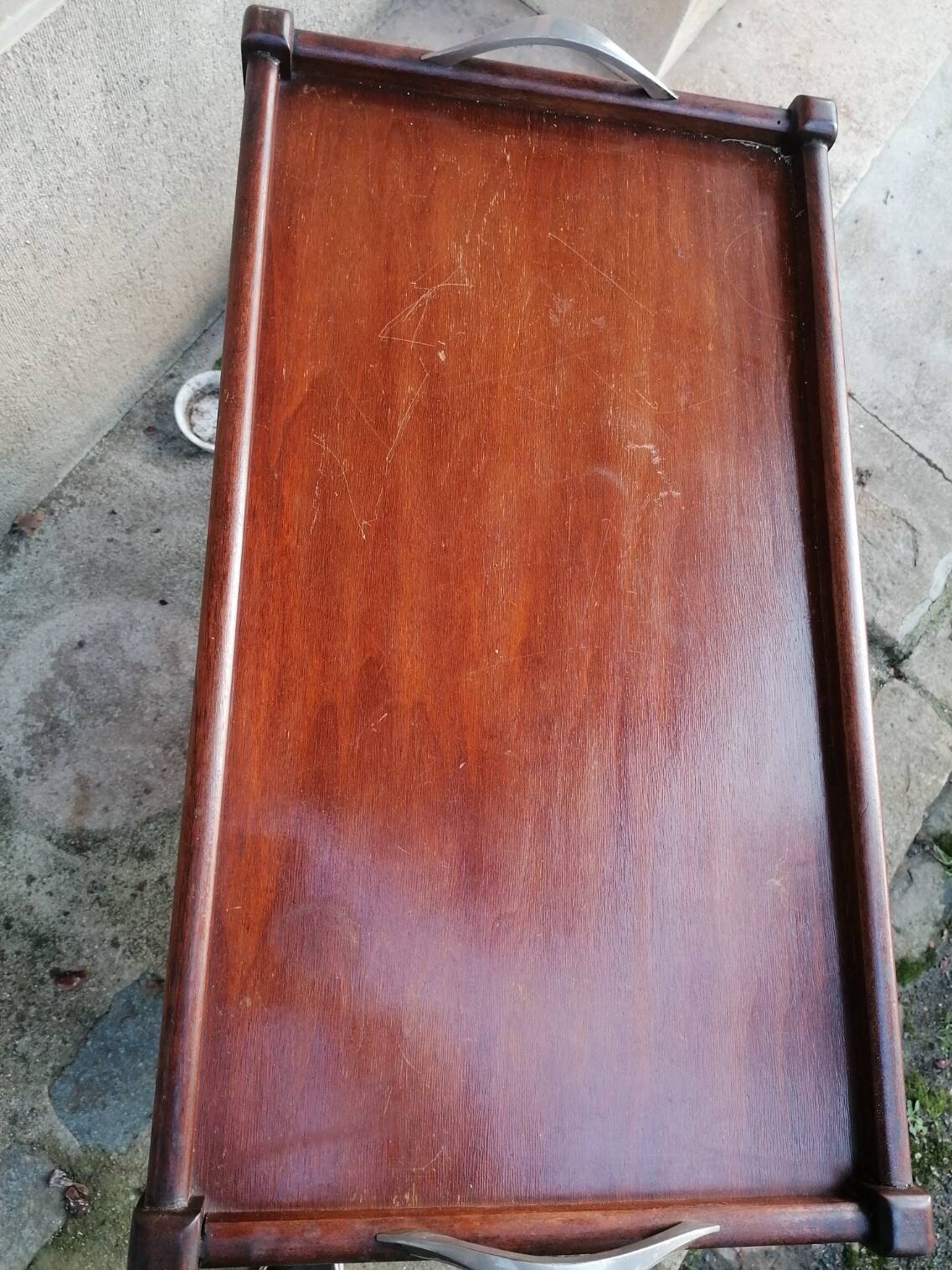 Art Deco wooden serving trolley on wheels.