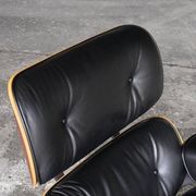 Fauteuil Lounge par Ray & Charles Eames pour Vitra, années 2000.