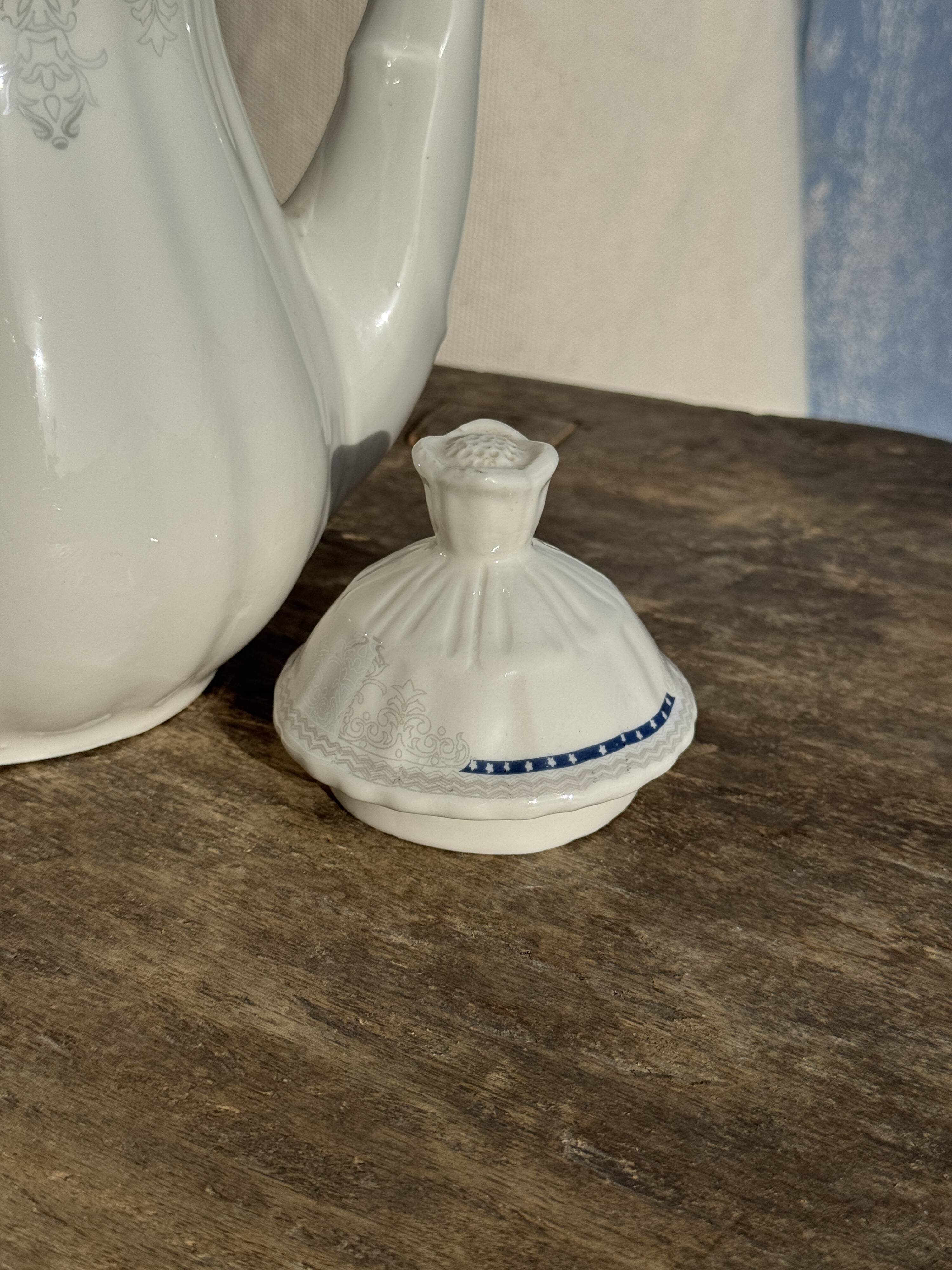 White earthenware teapot with blue and silver trim H22.5