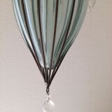 Glass suspension in cage