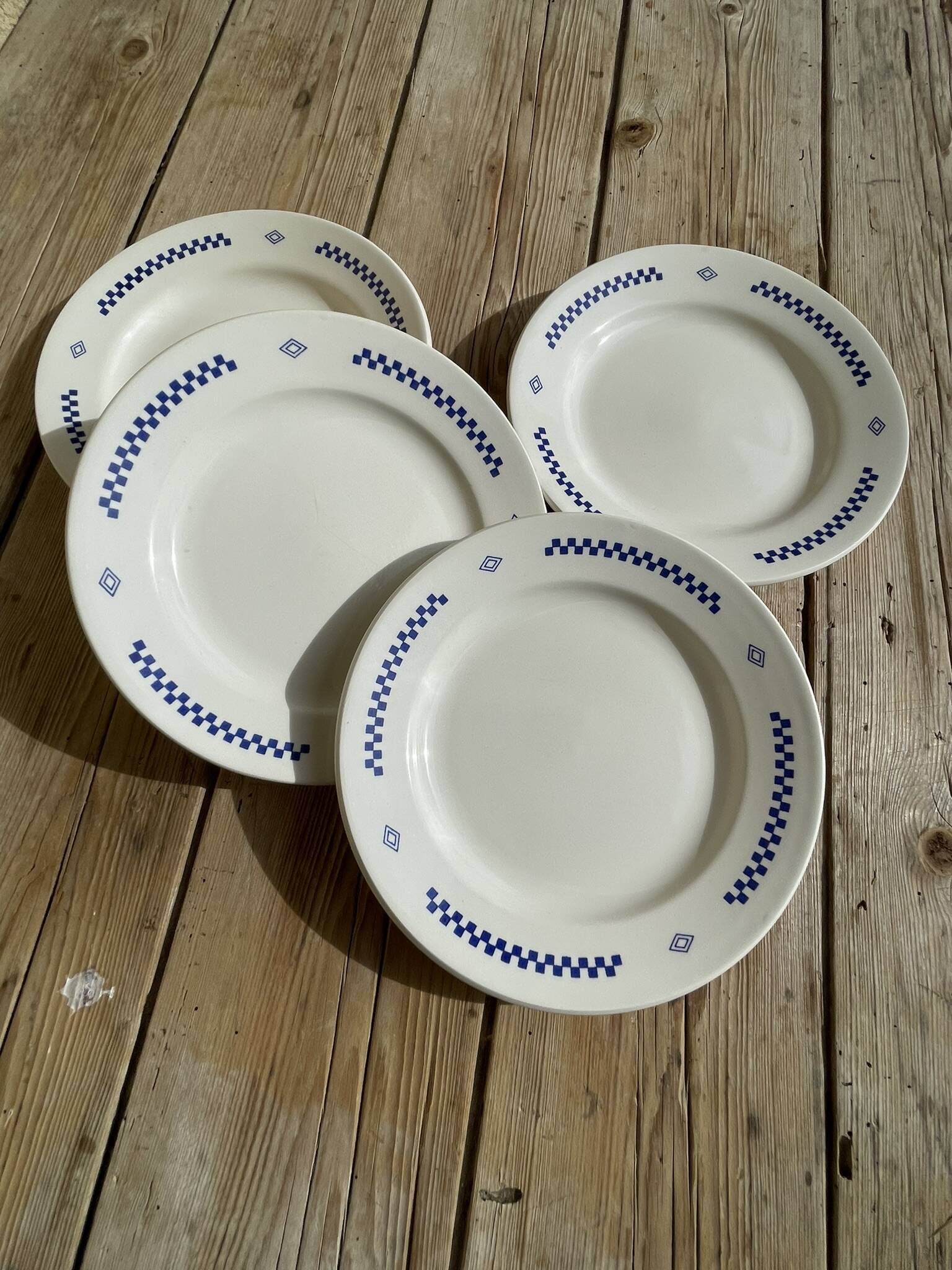 Set of 4 small vintage plates