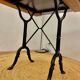 Wrought iron foot bistro table and wooden tray