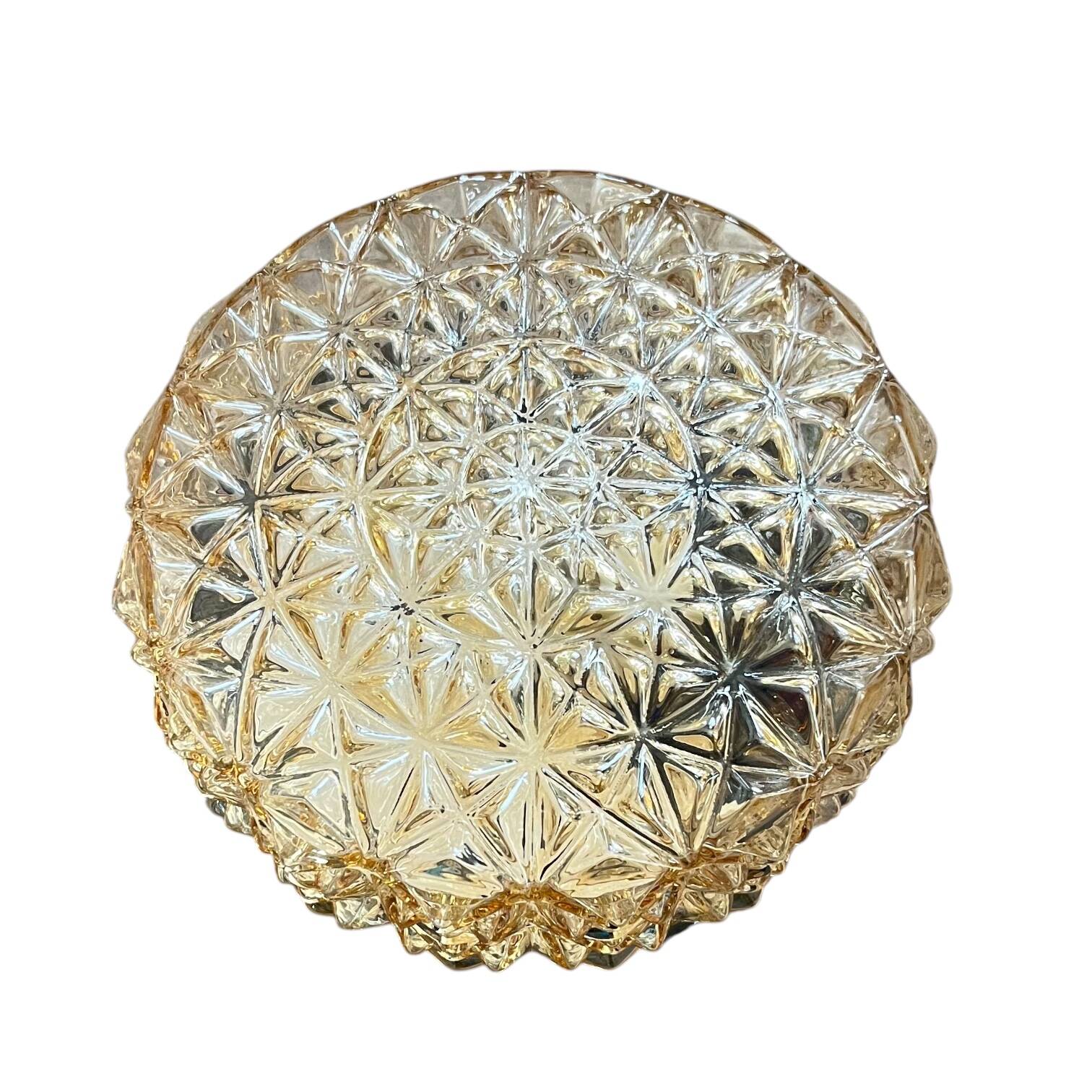 Vintage 1970s round wall light ceiling fixture with amber glass and gold.