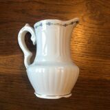 Old milk jug limoge