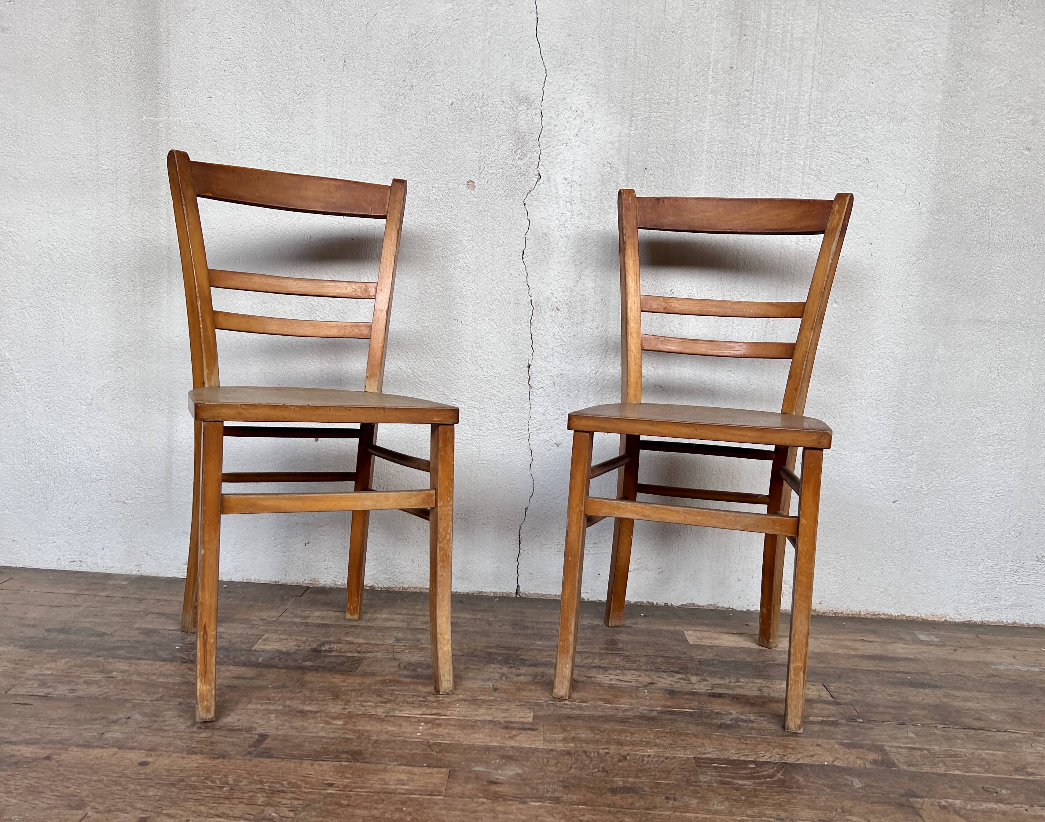 Pair of parisian wooden bistro chairs