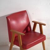 2 red armchairs, circa 1960