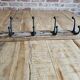 Solid teak coat hook with 4 double cast iron hooks