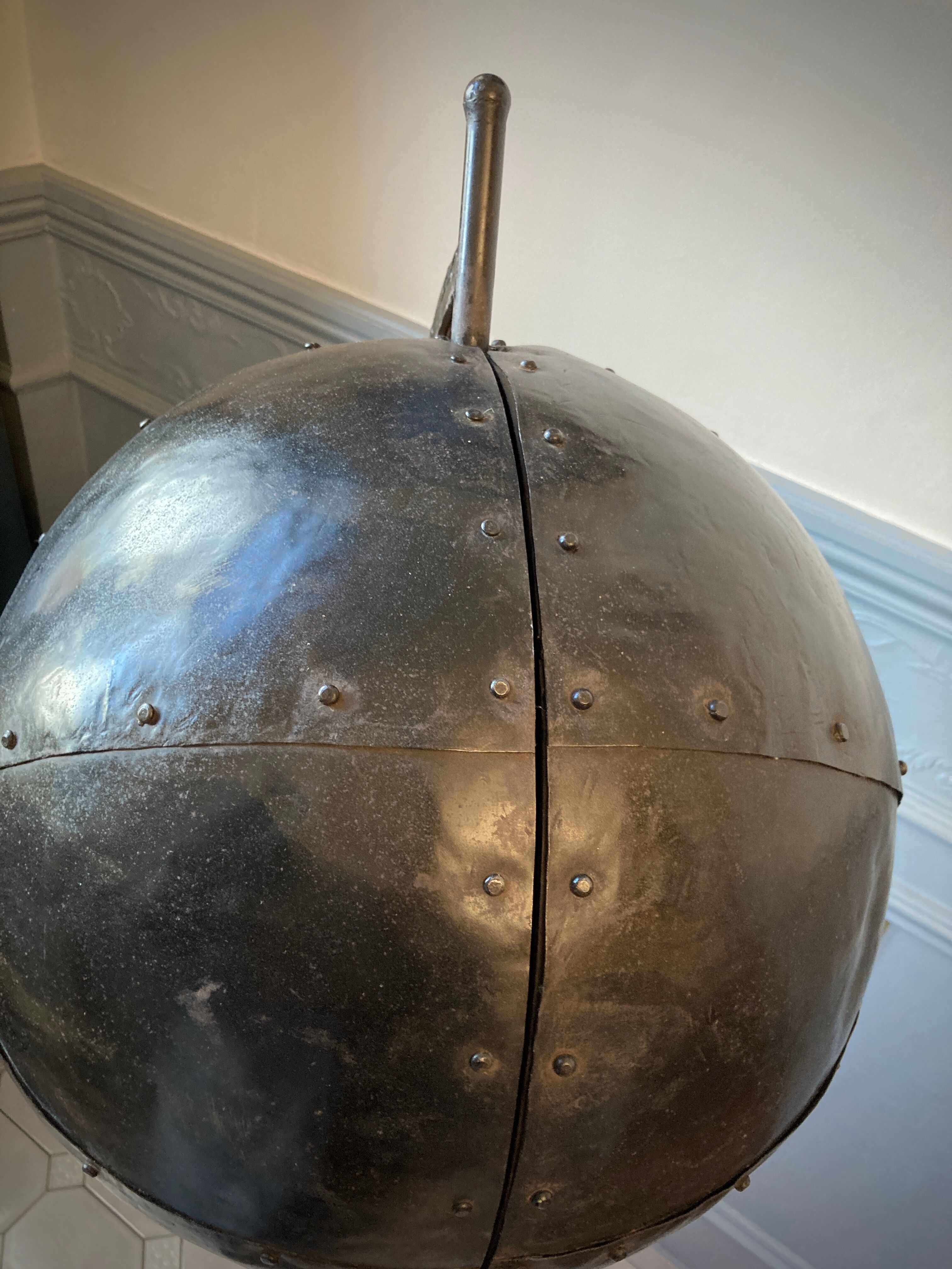 Atypical industrial furniture riveted sphere