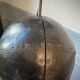 Atypical industrial furniture riveted sphere