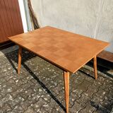 Dining table with tapered legs