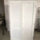 Wooden cabinet with wardrobe and shelves