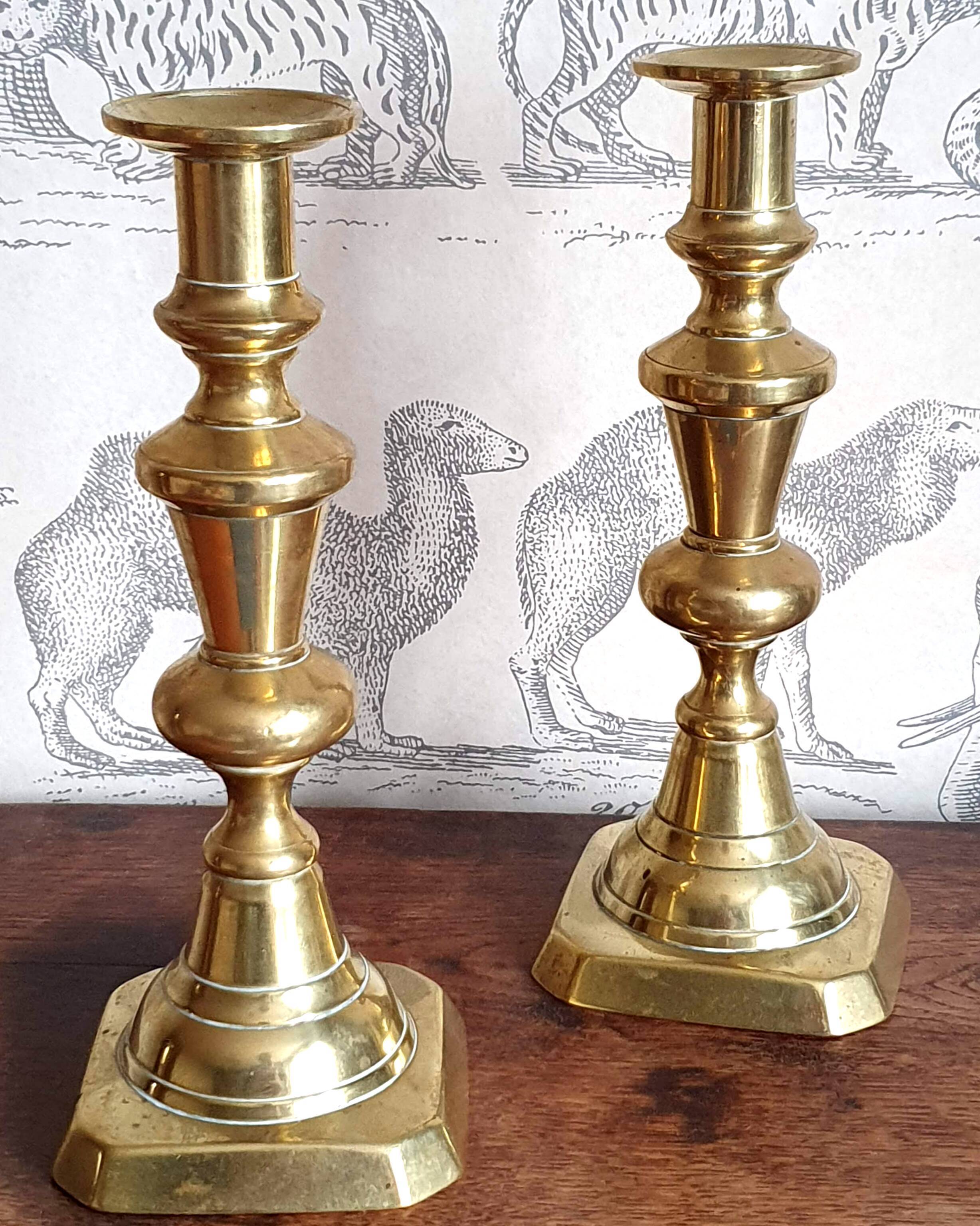 Duo of brass candle holders