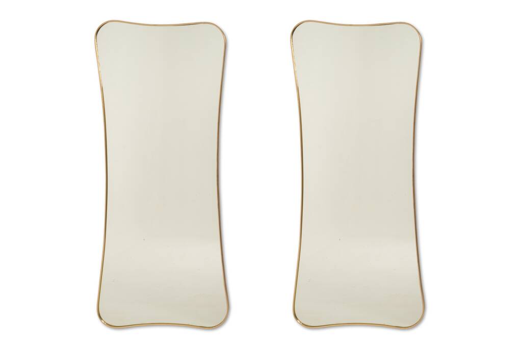 Golden brass mirror in the style of Gio Ponti. 1980s or 1990s.