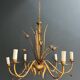 Golden Metal Chandelier with Reed Bouquet Decoration. Coco Chanel Style. Work